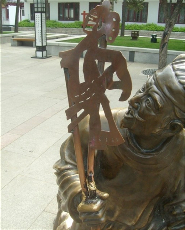 鑄銅皮影戲雕塑.jpg 鑄銅皮影戲雕塑.jpg