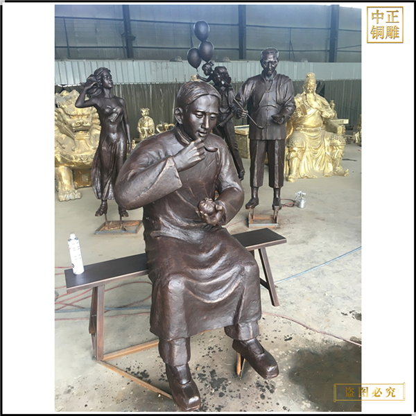 吃包子人物銅雕塑