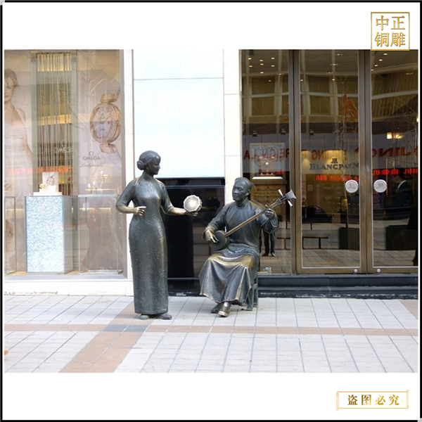 街邊彈唱古代人物雕塑.jpg